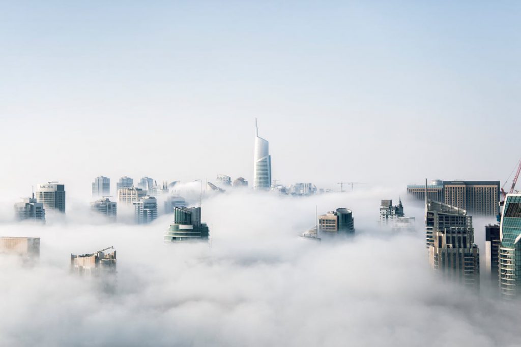 cityscape under cloud cover