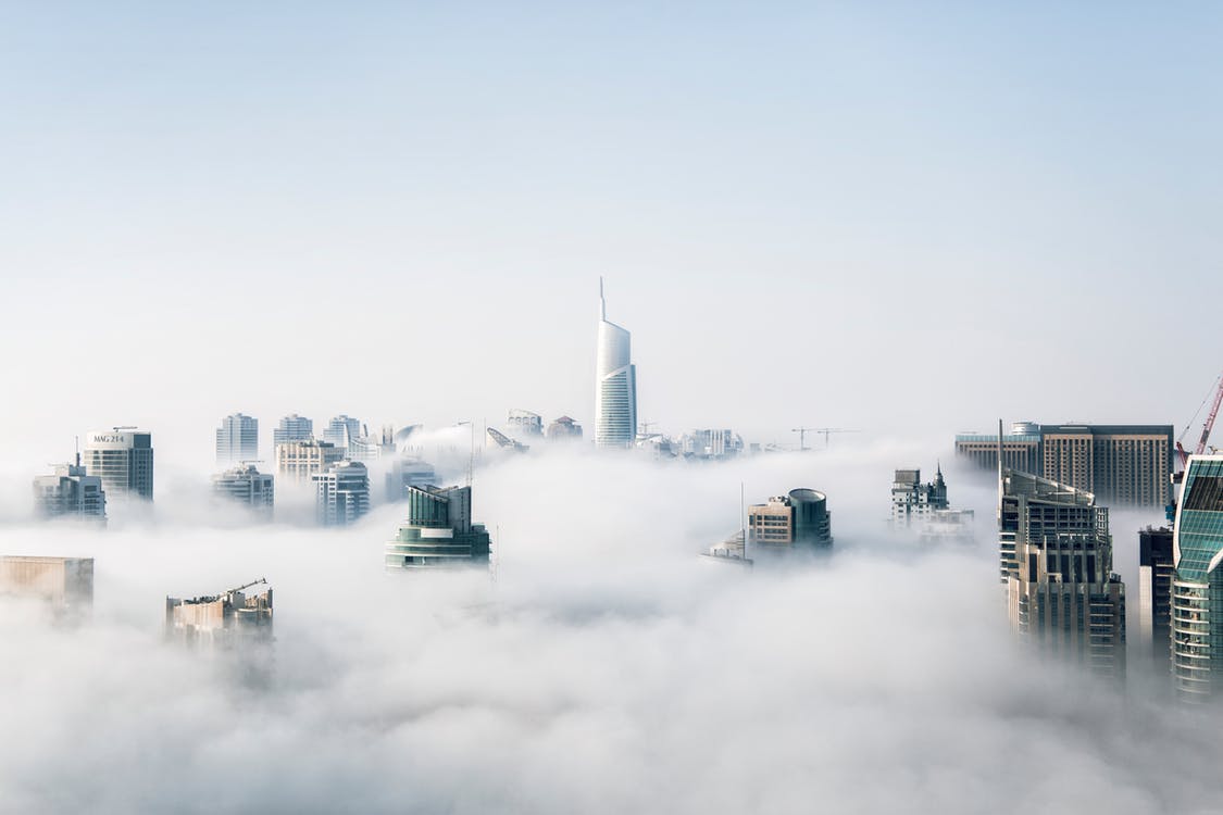 cityscape under cloud cover